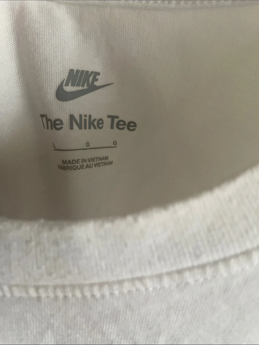 Nike White Short-Sleeve Graphic Tee with Multicolor Accents